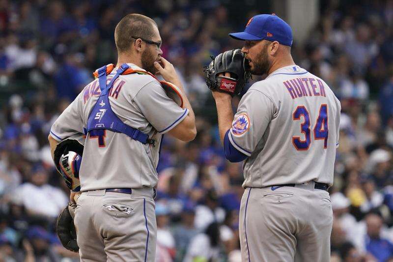 Hoerner gets 3 hits, Cubs stop skid with win over Mets