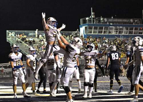 Who benefits from the expanded IHSA football playoffs?