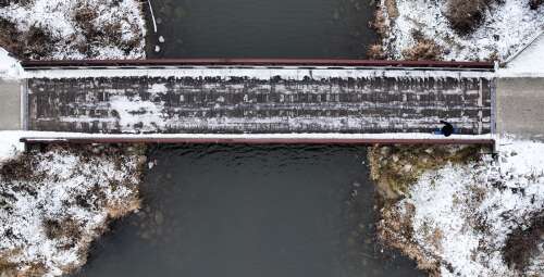 Skyview: Snow-covered bridge is gateway to outdoor winter activities - Vimarsana News