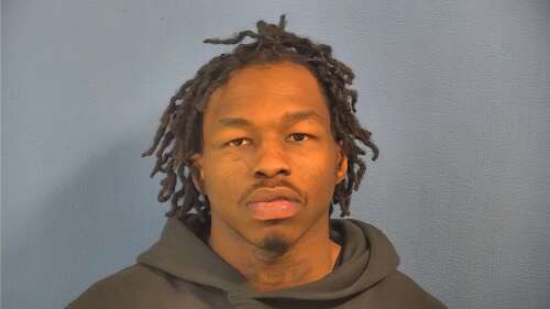 Man charged with hitting police car during chase