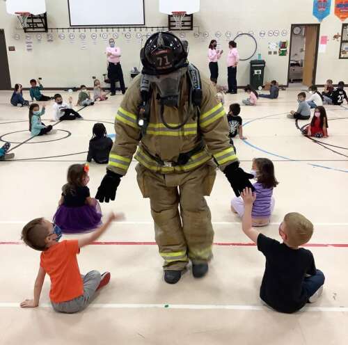 Gurnee firefighters visit Spaulding School to teach fire safety