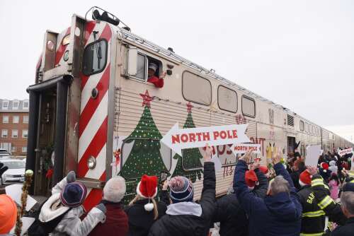 There was a snowball fight on a Metra train Saturday. But not only was it OK, it was encouraged, because the train was full of children, firefighters, police and others en route to see Santa Claus. In...