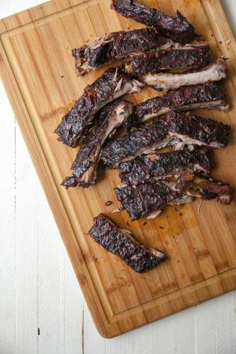 Spice rub, basting sauce add layers of flavor to these Cajun ribs