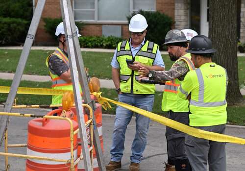 ‘It’s horrible’: One worker rescued from Downers Grove storm sewer, another missing after torrential rain