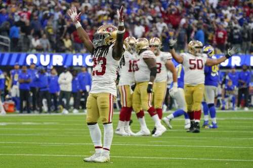 49ers clinch playoff berth by holding off Rams 27-24 in OT