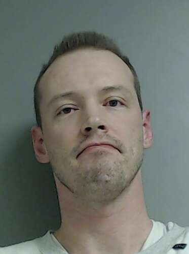 Man charged with recklessly firing gun in to neighbor’s apartment
