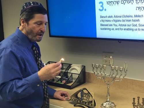 As Jews across the suburbs prepared to light the first menorah candles on Hanukkah, they were stricken by the news of a terror attack Sunday during a holiday celebration Sydney, Australia that claimed...