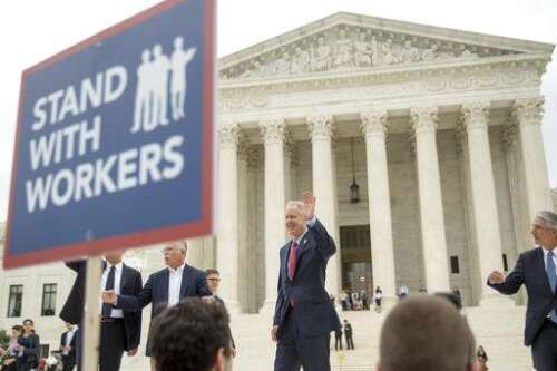 The Latest: California pans Supreme Court union decision
