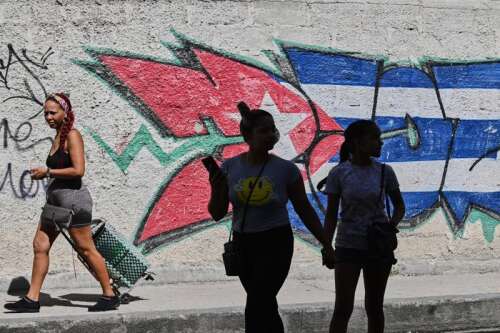 Cuba pushes through sweeping free-market reforms in biggest economic shift since the revolution