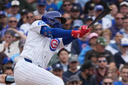 Cubs await trade deadline after close loss to Yankees
