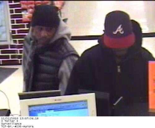 Aurora police hunting two bank robbery suspects
