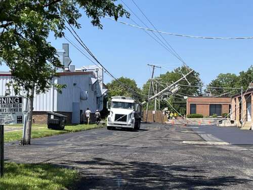 Truck hits electrical pole and knocks out power to local businesses