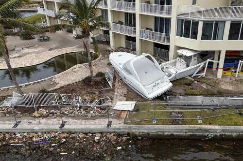 At least 56 dead and millions without power after Helene's deadly march ...