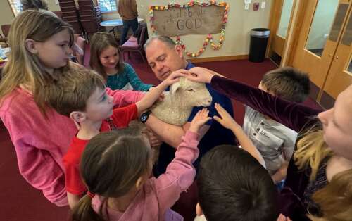 Children meet a little visitor at Shepherd of the Prairie Church - Vimarsana News