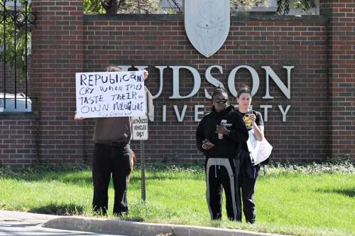 Turning Point USA CEO Erika Kirk brought her “America: Love it or Leave It” tour to Elgin’s Judson University Tuesday and was greeted by a crowd who lined up early to attend — and a handful of...