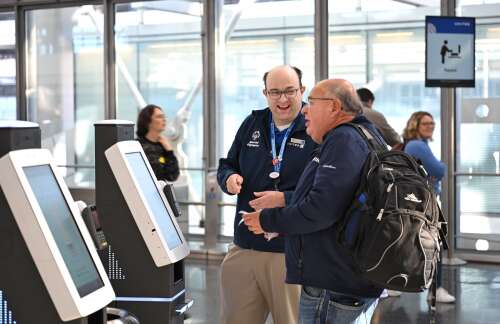 From way-finding to tech help: Meet the Special Olympics athletes who ease flying through O'Hare