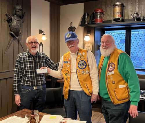 Dundee Lions give donation to AID - Vimarsana News
