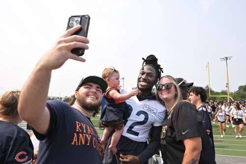 Thousands of diehard Chicago Bears fans swarmed Stevenson High School’s athletic stadium Monday for a rare team practice away from Halas Hall. They were excited to see their favorite players get rea...