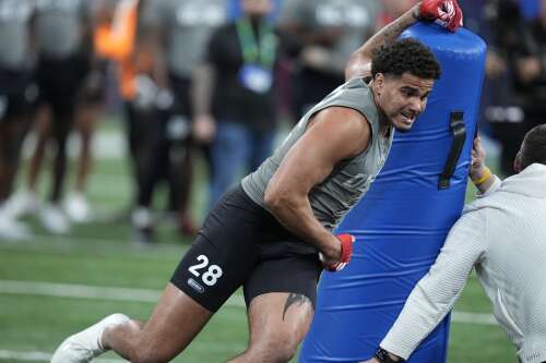 Bears trade back into draft to get edge rusher Booker from Kansas in fifth round - Vimarsana News