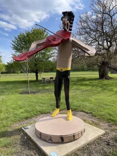Metal artist’s ‘Fiddler in the Field’ stands out in St. Charles sculpture park