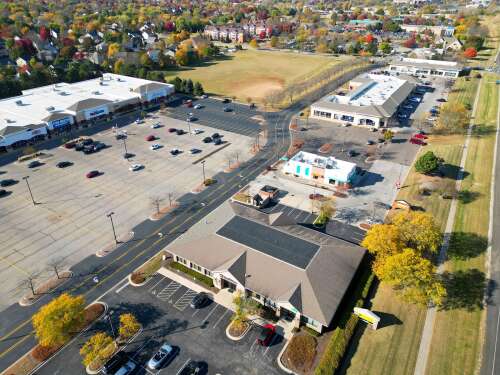 Geneva shopping center sells off four outlots