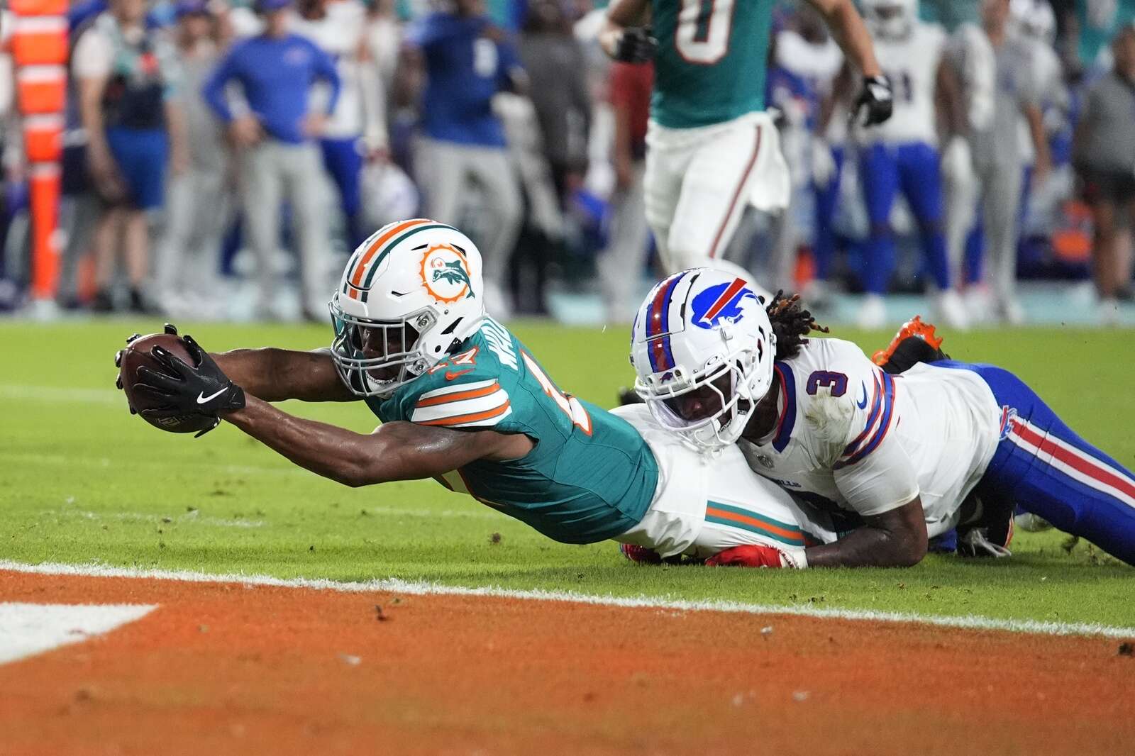 Cook scores 3 TDs to help Bills rout Dolphins 31-10, Tagovailoa leaves with concussion