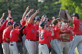 Conant celebrates with the trophy at the MSL baseball championship game at Buffalo Grove High School on Friday, May 17, 2024.