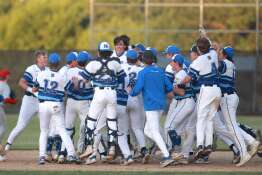 St. Charles North players celebrate their Class 4A St. Charles North Sectional semifinal game win against South Elgin on Wednesday, May 29, 2024.