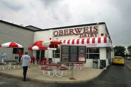 The new owner of Oberweis Dairy does not plan to close any stores or make any large cuts to the business.