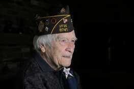 Don Carter landed with the US Army in Normandy on D-Day Plus 2 during World War II. He is now 99 years old and poses in his Libertyville home on June 5.