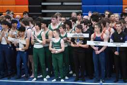 Participants are lined up after being introduced at the start of  the boys state gymnastics meet at Hoffman Estates High School on Saturday, May 11, 2024 in Hoffman Estates.