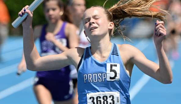 Prospect’s Meg Peterson crosses the finish line as the Knights win the 3,200-meter relay during the Class 3A girls state track and field finals on Saturday, May 18, 2024 in Charleston.