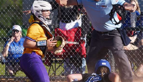 Wauconda catcher Madison May applied the tag but Lakes’ Liv Tauges is called safe at home during the top of the seventh inning during the Class 3A Antioch softball sectional semifinal on Thursday, May 30, 2024 in Antioch.