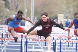 West Aurora's Azuriah Sylvester and Wheaton Academy's Canyon Roberts compete in the 110 Meter Hurdles at the Peterson Prep Invitational by Kaneland on Saturday, April 20,2024 at West Aurora High School in Aurora.