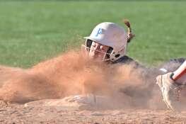 Prospect’s Gianna Catanzano steals second base as Hersey’s Grace Grabowy takes for the throw in a softball game in Arlington Heights on Wednesday, April 24, 2024.