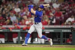 Cubs’ Miles Mastrobuoni watches his RBI single against the Cincinnati Reds in the seventh inning on Tuesday.