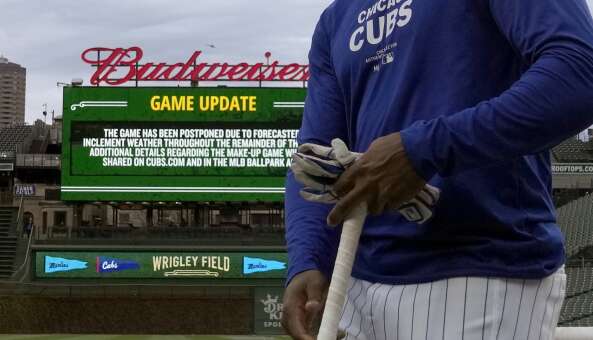 The Cubs' Alexander Canario walks to the dugout after batting practice and shortly after Thursday’s game against the Miami Marlins was postponed. The teams are scheduled to play a split doubleheader Saturday.