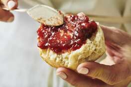 Spread freshly made strawberry jam on a scone for a wow treat for Mother’s Day.