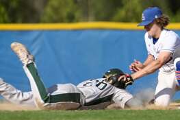 Grayslake Central’s Brendan Kirkner just manages to get back to the bag ahead of the tag by Lakes’ shorstop Jaden Jackson after nearly getting picked off second base during the first inning of a baseball game on Tuesday, April 30, 2024 in Lake Villa.