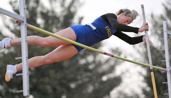 Wheaton North’s Emme Smith in the pole vault at the Wheaton Warrenville South Tiger Invitational girls track and field meet in Wheaton on Friday, April 26, 2024.