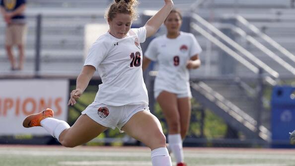 Libertyville's Shea Krakowski (16) shoots on goal and scores during the Class 3A Hersey girls soccer sectional semifinals Tuesday, May 21, 2024 in Arlington Heights.