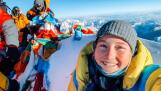 Naperville North graduate Lucy Westlake is all smiles at the summit of Mount Everest after becoming the youngest American female to reach the top in May 2022.