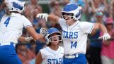 St. Charles North’s Abby Zawadzki (right) celebrates with teammate Addy Umlauf (left) after Zawadzki drove in three runs during the Class 4A St. Charles North Supersectional against Whitney Young on Monday, June 3, 2024.