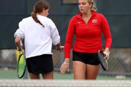 Benet Academy’s Clare Lopatka, left, and Shane Delaney celebrate a point during the 1A doubles championship at the Illinois High School Association state tennis finals Saturday, October 21, 2023, in Buffalo Grove.