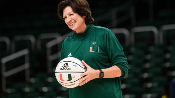 Katie Meier, of Wheaton, retired as University of Miami women's basketball coach with the most victories of any Hurricanes basketball coach, male or female.