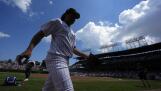 Chicago Cubs starting pitcher Shota Imanaga heads to the dugout after warming up in the bullpen before a baseball game against the Pittsburgh Pirates, Saturday, May 18, 2024, in Chicago. (AP Photo/Charles Rex Arbogast)