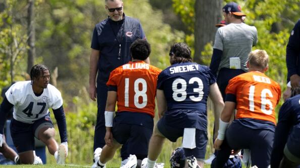 Bears head coach Matt Eberflus, left top, smiles as he talks with quarterback Caleb Williams (18) during Friday’s rookie camp at Halas Hall in Lake Forest.