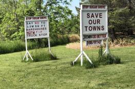Signs opposing a tax increment financing district and a development proposed for Sugar Grove have popped up, including this set on Route 47 near Seavey Road.