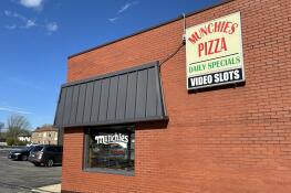 Munchies Pizza, at 25 Turner Ave. in Elk Grove Village, must close its doors by Oct. 1, but could get rent assistance for a potential relocation, under an agreement inked with village hall this week.