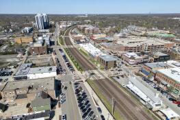 A developer aims to build an apartment complex on the south side of the train tracks running through Wheaton’s downtown. This view looks west along Liberty Drive downtown.